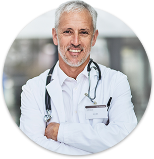 Male medical worker with a stethoscope around his neck, standing with arms crossed.